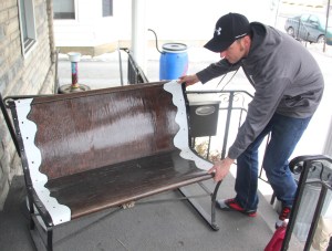 Volunteer Kyle Whitley, Tamaqua, helps fellow volunteers move items in preparation for Friday's celebration.
