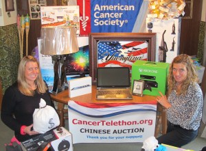 Event coordinators Mary Ann Dulaney, right, and her daughter Jessica Kutza, both of Coaldale, pose with some of the 500 prizes available March 23 during the Annual Chinese Auction and Bake Sale event held at the Lakeside Ballroom in Barnesville, Route 54. Doors open at noon and the auction drawing starts at 3 PM.