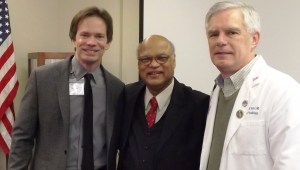 Bill Moyer, President, St. Luke’s Miners Campus (left); and J. David Bohri, MD, Medical Staff President and Chairman of the St. Luke’s Miners Campus Board of Trustees (right) present an engraved chair to honor (center)Dr. Dillswar Sahoo’s many years of service. 