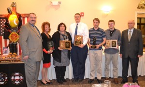 Pictured from left are MFC Fire Chief Robert Leshko, Tammy Martin (Bill Riccio Community Award), Michelle Soboleski (Robert Leshko McAdoo Fire Company Award), Nick Turner (Robert Leshko McAdoo Ambulance Award), Ryan Gasper (Firefighter of the Year Award), Jeff Payne (Eugene Duffy McHugh Award for Junior Firefighter), and MFC Deputy Chief Matthew Capulich.