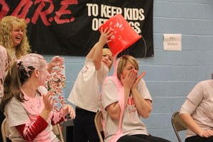 Teacher Audra Schlecht gets slimed by student Jacob Hehn.