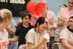 Teacher Amanda Peters gets slimed by student Gabe Arcand.