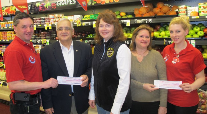 Pictured from left are Bill Nice, store manager; Tom Cara, board president, Tamaqua YMCA; Cathy Santee, Beta Sigma Phi; Donna Gerber, Beta Sigma Phi; Stephanie Sears, employee.