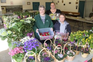 Pictured are Coaldale Lions Club Laura McElheny, customer Katie Mertz and volunteer Vincent Dundore. Not pictured are Lions Robert Ames, Ted Bortnick and Sip Vavra.