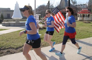 Running past Tamaqua's Depot Square Park are 'One Run For Boston' runners, from left, Monica Rebuck of Harrisburg, Karen Laughlin of Kingston, and Mary Nestor of Williamstown.