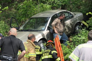 Elderly Woman Drives Through Car Port, Down Embankment, Locust Street, Hometown, 5-20-2014 (57)