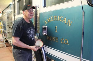 Firefighters Placing Flags, Bunting, American Hose Company, Tamaqua (17)