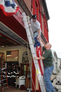 Firefighters Placing Flags, Bunting, American Hose Company, Tamaqua (5)