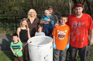 Pictured from front left are Damian Ems, 4; Makaylan Ems, 8; Carrie Jacovy, 6; David Sweatt Jr., 10; and David Sweatt Sr.  In back are Brittany Wetherspoon, left, and Josh Moyer, holding Lucas Moyer, 2. 