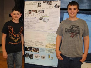 Pictured with their science project are students Dylan Crowley, 12, and Dustin Ulrich, 13. Their project title was "Forced Induction vs. Naturally Aspirated".