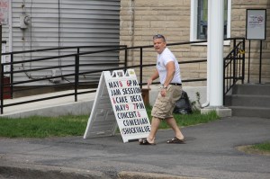 Shannon Rega Placing Sign Out Front of Community Arts Center, Tamaqua, 5-5-2014 (4)