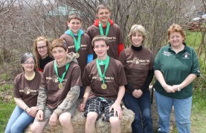 Pictured from left are Mighty Oaks members Fran Lenahan (teacher), students Nathan Cunfer, Jonathan Hillanbrand, guest Audrey Wargo (Secretary for Carbon Conservation District), and Lions Club Liz McElwee (District 14-U  Governor). From back left are teacher Elyse Gair, students Matthew Doherty and Gabe Bauer.