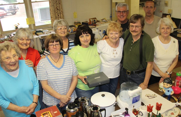 Pictured from left are Betty Dolinsky, Roberta Hollenbach, Diane Gould, Libby Klingaman, Reverend Darryl Kensinger, and Lois Comisac. From back left are Nancy Miller, Ruth Schwoyer, Gary Wetterau and Mike Trubilla.