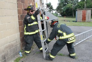 Firefighters Shawn Martin and Mike Hubert (both with Citizen's Fire Company of Tamaqua) take part in the class.