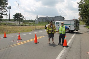 Hometown Fire Police volunteers Todd Witkowski and Merle Wertman direct traffic at the Morea Road and Interstate 81 on-ramp.