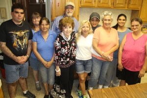 Pictured from left are volunteers John Kruczek, Terry Masters, Philomena Gogal, Jessica Mitchell, Rita Marie Trucios (director), and Nancy Ziegler.