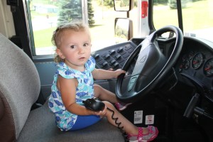 Girl at Drivers Seat of School Bus, Truck Show, Fire Company, West Penn, 8-17-2014 (2)