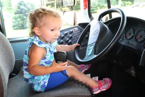 Girl at Drivers Seat of School Bus, Truck Show, Fire Company, West Penn, 8-17-2014 (5)