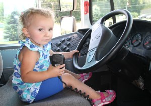 Girl at Drivers Seat of School Bus, Truck Show, Fire Company, West Penn, 8-17-2014 (6)