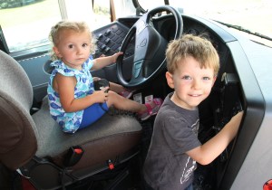 Girl at Drivers Seat of School Bus, Truck Show, Fire Company, West Penn, 8-17-2014 (8)
