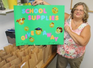 Pictured with the school supply kits is giveaway coordinator Sue Fritz.