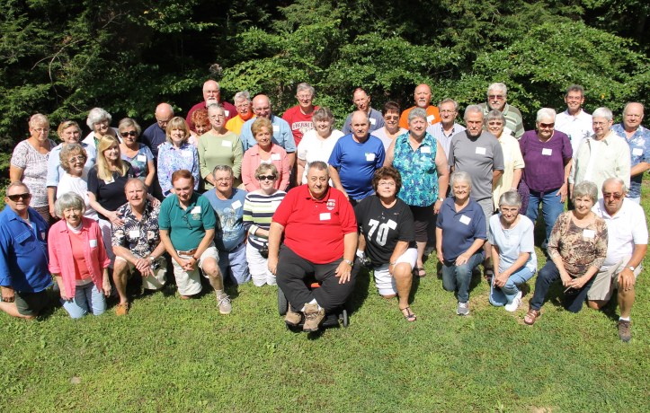 This listing is a combination of both 1962/1963 classes and spouses an/or significant others. First row from left are Ron Dietrich, Sondra Hutchinson Meyers, Bob Fagan, Joe Young, Jim Milot, Lois Swinburne Stanell, Clark Hamm, Cheryl Willing Comisac, Betty Holmberg Horton, Diane Coombe Middlecamp, Judy Brode Kellner and Dave Thomas. Second row from left are Anna Mary Stegmeier Milot, Cynthia Zimmerman Fagan, Linda Swank Semko, Carolyn Serfass Cochrane, Nancy Shay, Jackie Fredricks, Richard Troxell, Judy Troxell, Carolyn Hower Soley, Gene Middlecamp, Diane Wagner Malay, Judy Merkel Moyer, Bob Zehner, Tom Eltringham, Sally Mantz Mateyak, Cheryl Pickenheim Thomas, Joanne Chickirda and Roger Tyson. Third row from left are Ellen Swenson Fugere, Sandy Stegmeier Barnes, Judy Felker Barron, Ricky Boyer, Angie Caputo, Pat Fredericks, Erinie Comisac, Joe Gustus, Stanley Yanus, Barry Storch, Bruce Keich and Roger Tyson. (Attending picnic, but not in photo were George Barron, Roger Fugere, Larry Hoppes, Darlene Keich, Bill Klotz, Jack Malay, Larry Moyer, Bill Semko, Joyce Bankes Titus, Beth Ann Spokas Yorke, Marie Shucavage Zehner, Faye Hartranft Ziolko.)