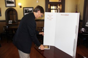 Pastor Michael Frost prepares his worship program.