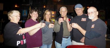 Pictured toasting their success are, from left, Doris Arsenault, Angelique Swolensky, Lisa Hiles, Sylvester Vavra, Bob Dobosh, and Bill Boyle.