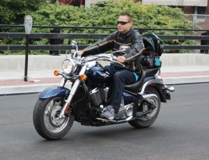 First motorcycle rider on new bridge.