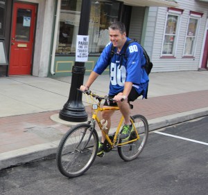 Bob Nelson was the first bicycle rider on the road after the bridge opened.