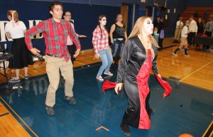 Members of the Drama Club dance to Halloween music during the event.