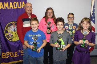 First place winners from front left are Chase Andrews, Stephen Modesto and Emily Lang. From back left are event organizer Vaal Kester, and Olivia Jones, Alexa Stianche. Not pictured was Brayden Knoblauch.