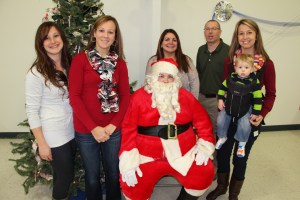 Pictured with Santa are members of the Recreation Commission, (left to right) Michele Midas, Anita McArdle, chairman Jodi McAndrew, Franklin Klock, and Amber Zuber (holding one-year-old Kallan Crampsie).