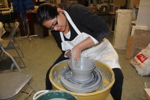 Marcia Shellhammer, Jim Thorpe, uses a pottery wheel to create a Japanese soup bowl.