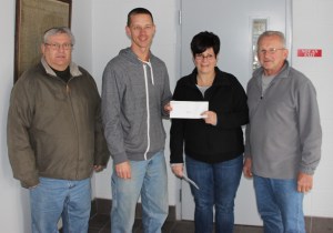 Pictured from left are Joe O-Gurek, treasurer, Summit Hill Lions Club; Andrew Leibenguth, board member, Tamaqua Salvation Army; Judy Midas, President, Summit Hill Lions Club; and Tom Midas, member, Summit Hill Lions Club.