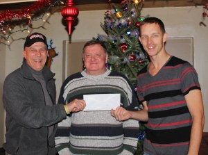 Pictured from left are Paul Corinchock, member, Schuylkill Carbon Marine Corps League; Commander; Andrew Leibenguth, board member, Tamaqua Salvation Army.