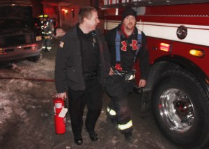 Pictured with an extinguisher is Tamaqua Police officer Mike Hobbs.