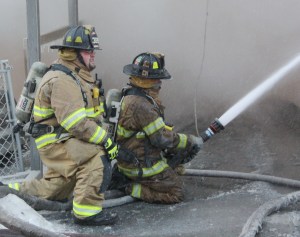 TamaquaArea.com File Photo / Volunteer firefighters work in minus 6 degree weather to battle a house fire on South Ferguson Street in Shenandoah on January 7 of last year.