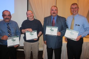 Receiving the Green Cross Award from left were MFC firefighters (from left) Gary Perna Sr., Michael Bowman, Robert Leshko, and Daniel Leshko. 