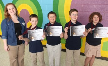 Pictured from left are teacher Sam Yachera; 