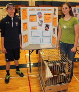 Pictured are Carson Schloener with Brooke Zellner with their chicken project titled 