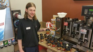 Tamaqua Turkey Hill employee Matt Landis helps prepare dozens and dozens of hot refreshments for firefighters battling a fire this past weekend in West Penn Township.