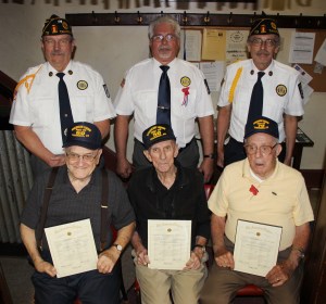 Pictured from front left are John C. Hafer (60 years), Steve Daderko (50 years) and Earl Bridygham (70 years). From back left are David Meredith (adjutant), Frank Bobick (Sons of the American Legion), and Jack Kulp (Sgt At Arms and 2nd Vice Commander).