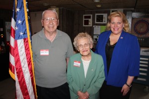 Pictured from left are Bernie Pavlik, an ex-POW of the Korean War; Estelle Sverchek, 97, retired WWII nurse; and soloist Angela Nardini. 