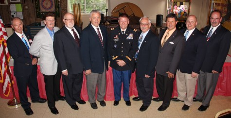 Pictured from left are Pastor Daniel Smith; American Legion 30th District Vice Commander Harry Wynn III; Lansford Borough Council President Martin Ditsky; Carbon County Commissioner Bill O'Gurek; Lt. Col. Timothy Brooks, 213th ASG, PA-ANG; Carbon County Commissioner Wayne Nothstein; Carbon County Commissioner Tom Gerhard; State Representative Doyle Heffley; Henry Desrosiers, DVA, Carbon County.
