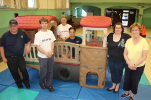 From left are Wegman's employees Tom Covach, Joey Rozwadowski, Denise Angeli, Heidi Kubert, and Child Development staff Katherine Figueroa and Mary Lacher.