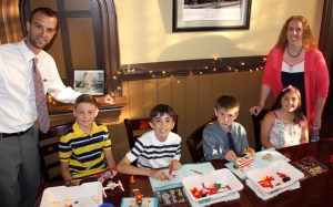 Tamaqua third-graders, from left, Jesse Gormley, Nicholas Hydro, August DiCarlo and Delia Coggiano demonstrated their skills in building simple machines using Lego pieces. Also pictured are their teachers Zac Evans and Jolene Barron.