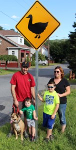 Pictured from left are father Jim Cook, 2-year-old Gavin Cook, Keenan Cook and mother Shanna Cook. Also pictured is family pet Loola, a 5-year-old mix.