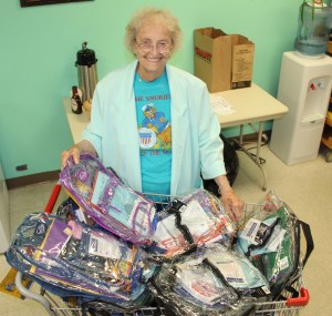 Pictured with some of the backpacks is Esther Stofocik, Social Worker, Tamaqua Salvation Army.