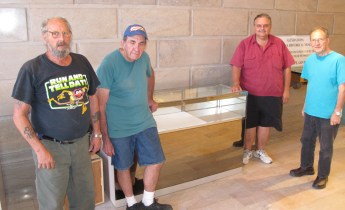 From left are David Green, Charlie Odorizzi, Gary Willing, and society president Dale Freudenberger.